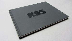hardback book clear foil debossed logo case bound KSS Design Group